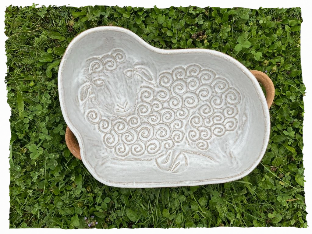 Beránek kudrnatý ležící